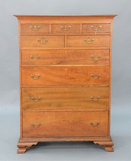 Chippendale Cherry Tall Chest, having large cornice molding over three short drawers over two short drawers over four drawers all se...