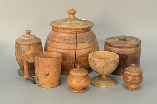 Assorted Group of Seven Treenware Pieces to include three round covered containers, one in burlwood along with two small covered pieces, burl mug and 
