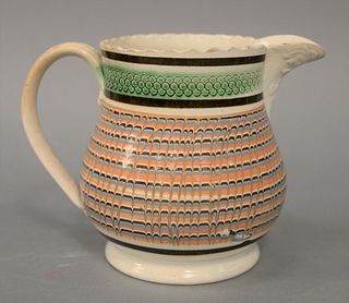 Pearlware Mocha Jug having engine turnings over large group of dentil pattern lines in three colors, top with navy edge, height 5 3/...