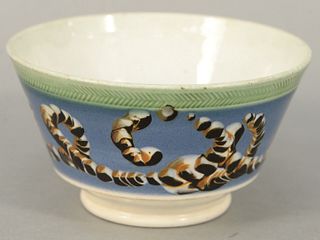 English Pearlware Bowl with engine turned band over earthworm decoration.
height 3 inches, diameter 5 1/2 inches.
Provenance: Estate...