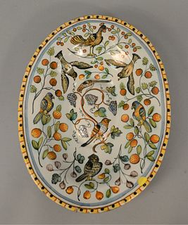 Earthenware Oval Deep Platter with birds and fruit with two labels on reverse "Roger Vernon and Ginsburg and Levy.
12" x 16".
Estate...
