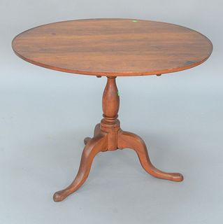 Round Cherry Tea Table, having dished top, over birdcage on turned shaft all set on tripod base.
height 27 inches, top 34 3/8" x 35 5...