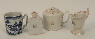 Chinese Export Group, four pieces to include tea caddy with cover; teapot with floral decoration; creamer and blue and white mug wit...