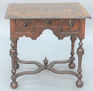 William & Mary Dressing Table having inlaid top over three drawers set on turned legs with X stretcher and ball feet.
height 29 1/2 ...