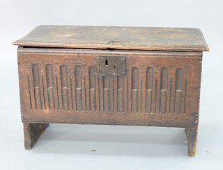 Diminutive Oak Lift Top Chest having carved front, English, 17th century, top with old lock cut out.
height 17 1/4 inches, top 11 1/...