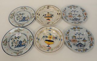 Three Pairs of Delft Plates, polychrome decorated with flowers.
diameter 9 1/4 inches.