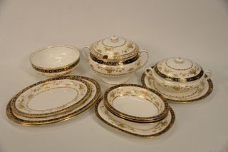 Twelve Minton Porcelain "Dynasty" Serving Pieces, cobalt blue border, ivory and white ground with raised gilt floral reserves consisting of large cove