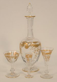 Thirty-One Piece St. Louis Massenet Clear and Gold Encrusted Crystal group, to include fifteen sherry stems, height 4 3/4 inches; fi...