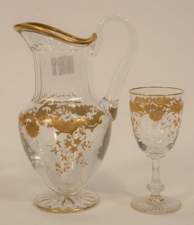 Thirteen Piece St. Louis Massenet Clear Gold Encrusted Crystal group, to include twelve continental or water goblets, height 6 1/4 i...