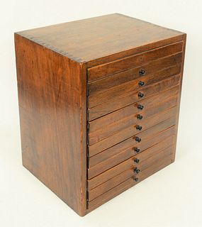 Medical Box, mahogany, having twelve flat drawers and locking door on right side.
height: 17 inches, top: 11 1/2" x 15".
Provenance:...