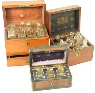Three Small Apothecary Boxes, 19th century, one with lift top opening to eight bottles over one drawer, one Watson and Wates Medicin...