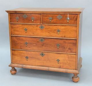 Queen Anne Chest, having cornice molded top over two short drawers over three drawers all set on round bun feet, having original bra...