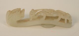 Chinese White Jade Belt Buckle, carved dragons.
length 4 inches. Provenance: A Scarsdale, New York Estate