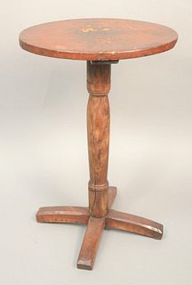 Oval Candlestand on turned shaft with X base, cherry, Connecticut circa 1740, height 24 1/2 inches, top 12 1/4" x 16 1/4". 
Literature: Connecticut Fu