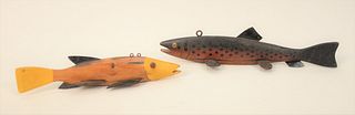 Two Large Fish Decoys, handpainted, carved wood with metal fins.
lengths 12 inches and 15 inches. 
Provenance: From the Marjorie & H...