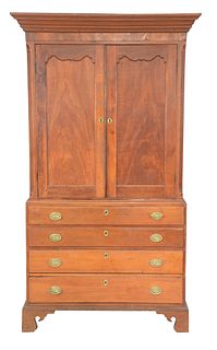 Matthew Edgarton Chippendale Cabinet in two parts, upper section with two paneled doors flanked by columns on lower section having f...