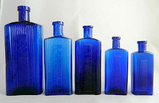 5 Poison cobalt rectangle bottles
