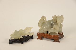 Two Carved Jade Figures to include carved goat or ram with two small rams, length 3 3/4 inches and a carved fish or koi, length 4 inches, both on carv