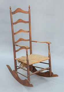 Slat back Rocker with five arched slats, Pennsylvania or Delaware, 18th century. 
height 47 inches.