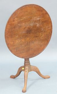 Mahogany Tip Table having dished top on birdcage overturned shaft on tripod base.
height 25 inches, top 27 1/2" x 27 3/4".