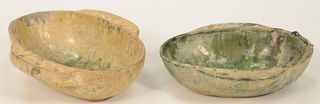 Two Chinese Glazed Pottery Ear Cups, green glaze and yellow glaze.
height 1 1/2 inches, length 5 1/4 inches.