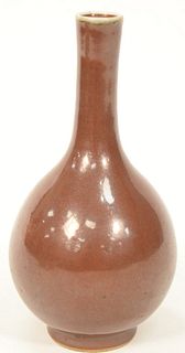 Chinese Brown Glaze Bottle having slender neck and white rim.
height 7 1/2 inches. 
Provenance: From the Lance & Irma Keller Collect...