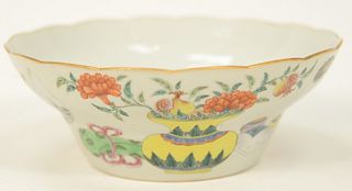 Chinese Famille Rose Porcelain Bowl having enameled painted antique vases, bat scrolls on exterior with scallop rim, light orange ma...