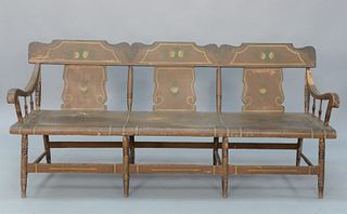 Windsor Bench having carved back over large plank seat with arms set on turned legs all in original brown paint with hand-painted fl...