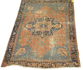 Heriz Oriental Carpet, probably late 19th or early 20th century, worn with holes and ends fraying.
9' 7" x 11' 5".