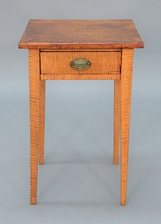 Federal Tiger Maple Stand one drawer on square tapered legs.
height 26 3/4 inches, top 17 7/8" x 18".
Provenance: The Provenance: The Estate of Diana 