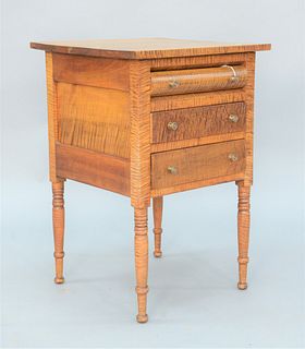 Sheraton Tiger Maple Stand having plain top over three drawers set on turned legs, circa 1800. 
height 29 inches, top 19 1/2" x 19 1...