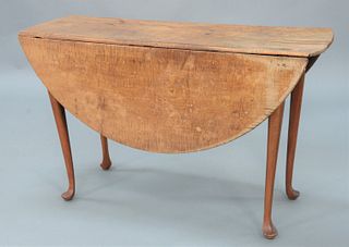 Queen Anne Drop Leaf Table with tiger maple round top on base with cabriole legs ending in pad feet, New England, circa 1740.
height...