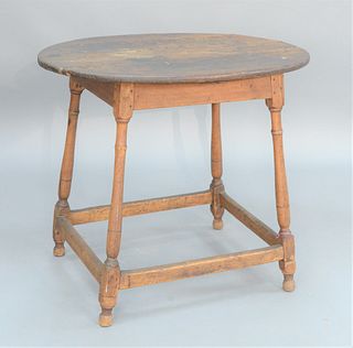 Tavern Table with Oval Top on four splayed and turned legs with box stretcher, circa 1740, probably Connecticut, (feet replaced). 
h...