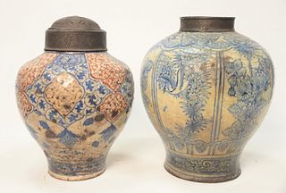 Two Early Jars in Persian taste, each fitted with metal collar decorated with Asian motif.
height 12 1/2 inches and 13 1/2 inches. 
...