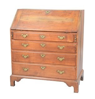 Chippendale Mahogany Desk having slant lid opening to reveal central door with two drawers flanked by three drawers on either side; ...