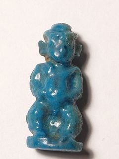 A Blue Faience Egyptian Amulet of Paitakos Late Dynastic Period. 664-332 BCE. 