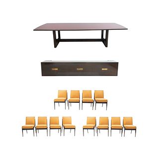 Comedor. SXX. Estilo modernista. En talla de madera. Consta de: Mesa con cubierta de vidrio rojo, 12 sillas y trinchador. Piezas: 14.