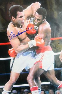 MOHAMMAD ALI AUTOGRAPHED 8" X 10" PHOTOGRAPH