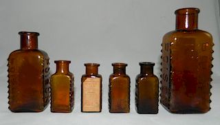 Poison - 6 rectangular amber bottles