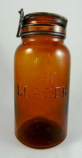 The Leader amber fruit jar
