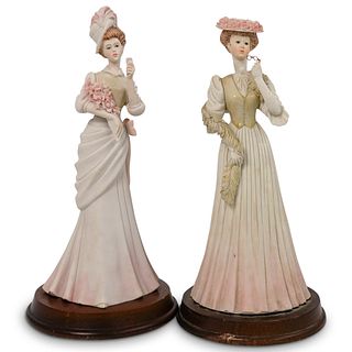 Pair of Pucci Arnart Porcelain Figurines
