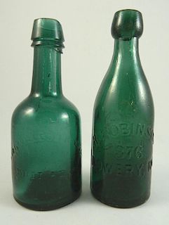 Soda - 2 round emerald green bottles
