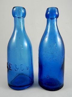 Soda - 2 round blue bottles