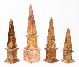 GROUP OF FOUR MARBLE AND STONE OBELISKS