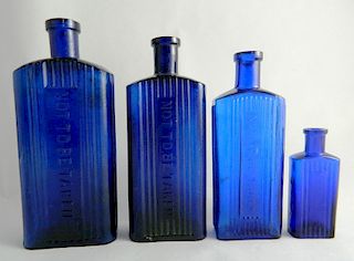 4 Poison rectangular cobalt bottles