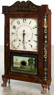 Eli Terry & Sons mahogany mantel clock with a stenciled crest and columns, 29'' h.