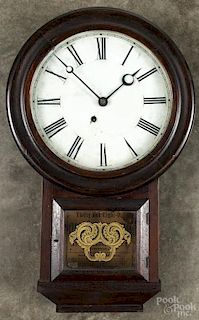Atkins Clock Co. rosewood wall clock, 24 1/2'' h.