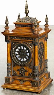 Ansonia Cabinet antique clock with an oak case, an eight-day spring driven movement