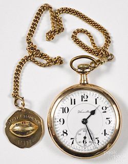 Hamilton Watch Co. gold-filled pocket watch with a gold-filled chain and a gold football pendant