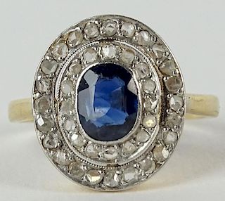 Lady's vintage French oval cut sapphire, diamond and 18 karat yellow gold ring.